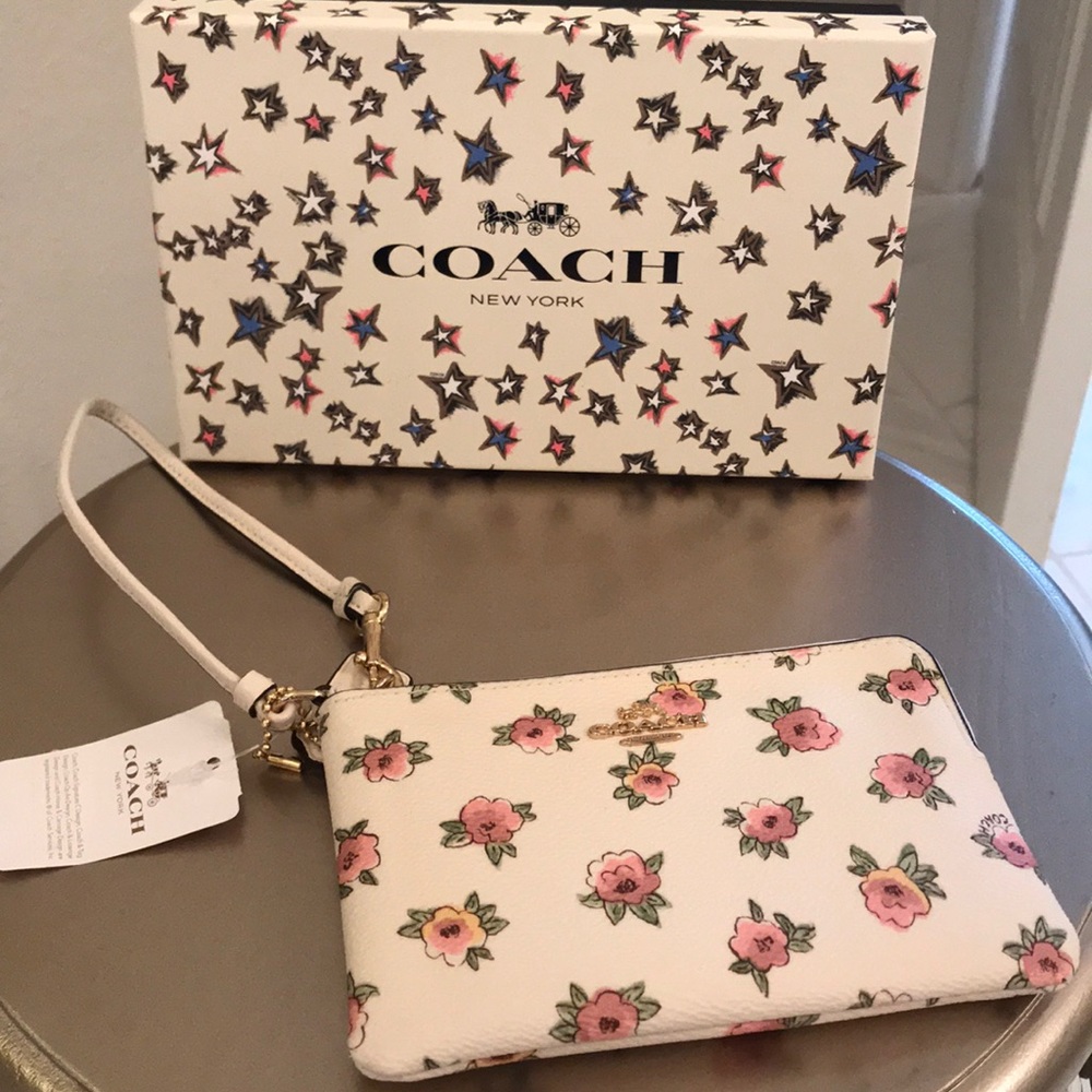 NWT Coach small wristlet cream w pink flowers. 💐